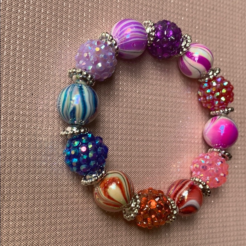 Two multi colored bracelets. - Picture 3 of 6